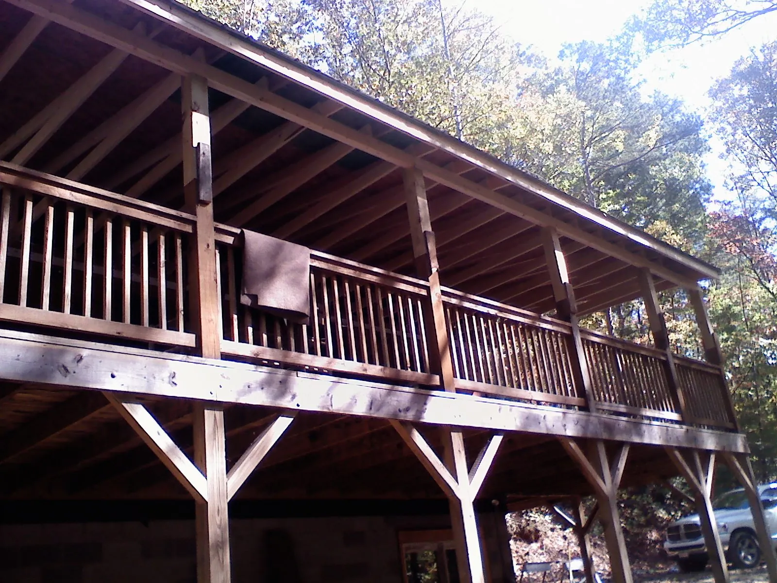 Timber framing under a new elevated porch and deck — Roof Leak Repair in Decorah by Roofing Brothers